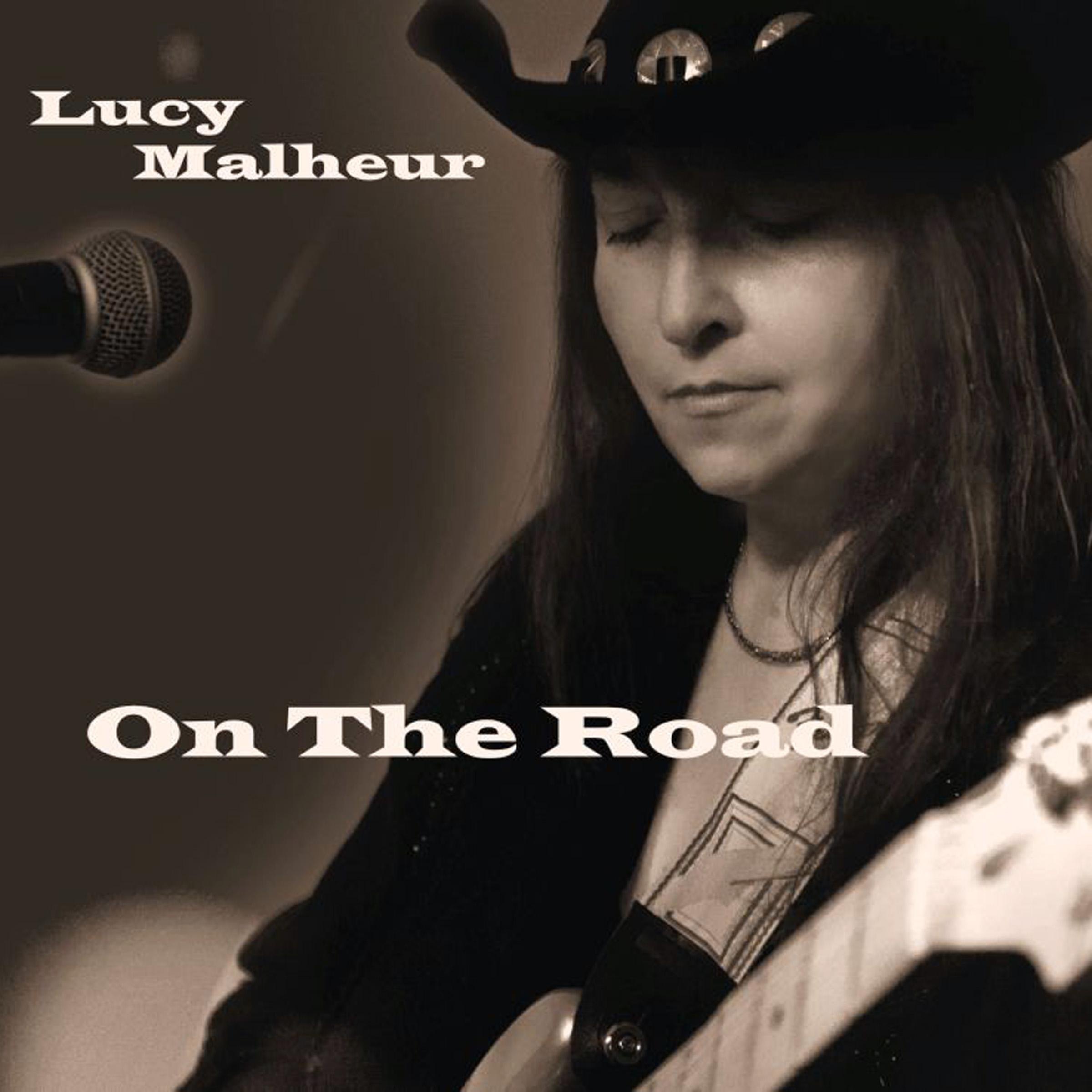 „On the Road - Single“ von Lucy Malheur in iTunes